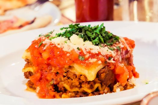 Italian cuisine, restaurant menu and food photography blog concept - Lasagna bolognese plate, traditional recipe with tomato sauce, cheese and meat