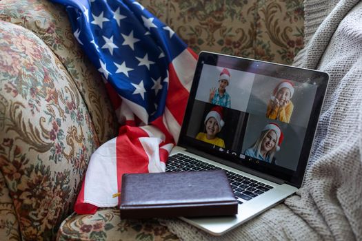 Studying and working with a laptop, usa flag, christmas.