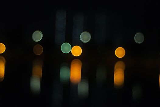 Blured night light. bokeh background, Blur concept . Abstract unfocused blured bokeh light dots background . Defocused christmas lights background Abstract Lights. Unfocused Light background.