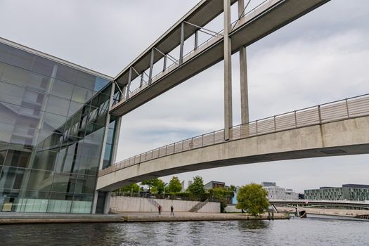 The two pedestrian bridges over the river Spree connect buildings of the federal government, Berlin, Germany