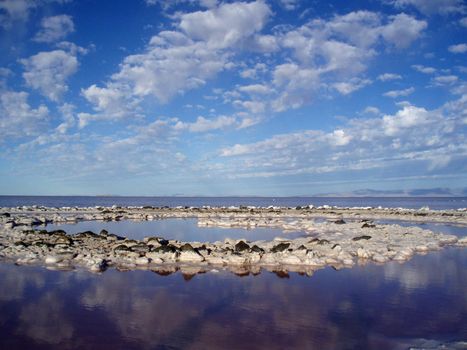 Utah - August 22, 2007: Center of the Spiral Jetty, Robert Smithson's masterpiece earthwork, which really has pink water due to unquie algae growing because of the high salt content is on the north side of the Great Salt Lake, about two-and-a-half hours from Salt Lake City.