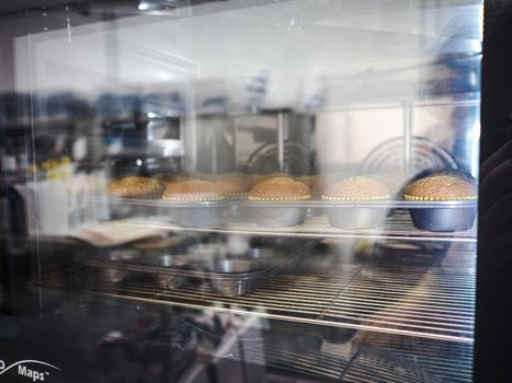 group of cupcakes cooking in a professional kitchen lab