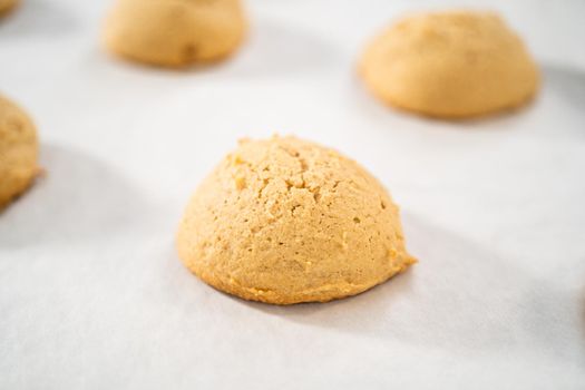 Cooling freshly baked eggnog scones on a kitchen counter.