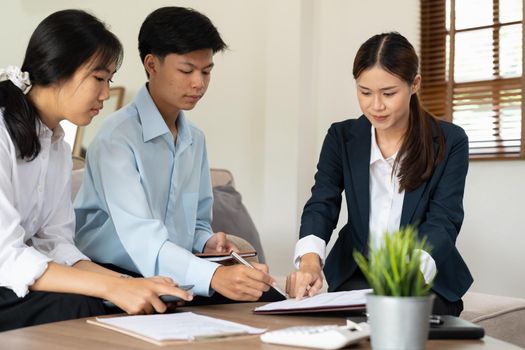 Businessman and partner signing contract on the meeting room