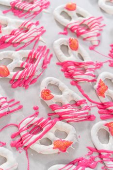 Gourmet chocolate-covered pretzel twists with seashell-shaped chocolates.