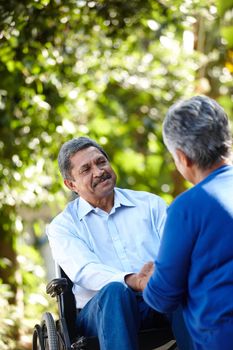 Ill be with you every step of the way. a senior couple talking outdoors