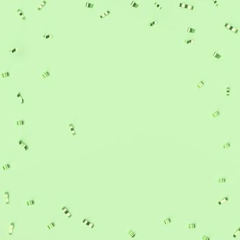 Confetti on a pastel green background. Festive backdrop. party concept. 3d rendering,
