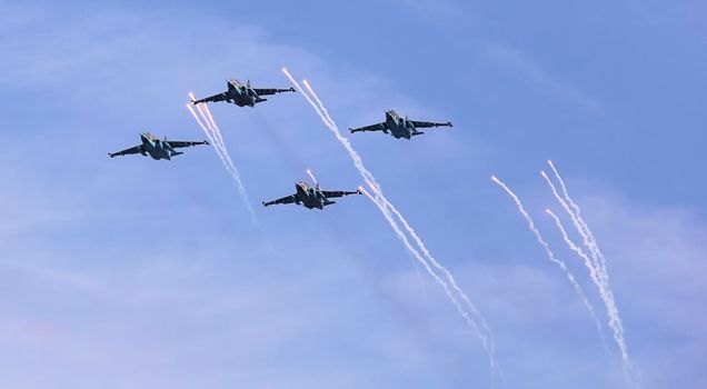 Su25 frogfoot attack aircraft close up in the sky with clouds. During an exercise in the Republic of Belarus.