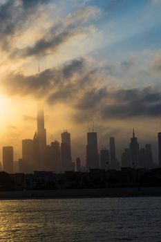 Dubai, UAE - 03.06.2021 Dubai public beach with city skyline on background.Sunrise hour