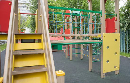 Colorful playground in the yard in the park. Safe playground for children, MODERN COMPLEX.