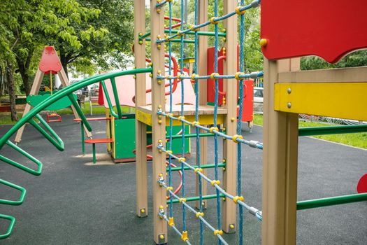 Modern Children's Outdoor Sports Play Complex with Slide, Rope Wall.