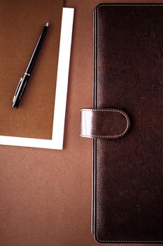 Productivity, work and corporate lifestyle concept - Vintage business briefcase on the office table desk, flatlay background