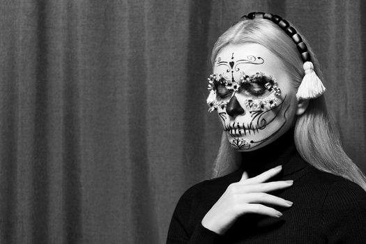 Beautiful Halloween Make-Up Style. Blond Model Wear Sugar Skull Makeup with Crown, pale Skin Tones and Waves Hair. Santa Muerte concept