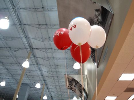 Concord - August 29, 2009:  Fry's Electronics Balloons float in the air inside store.