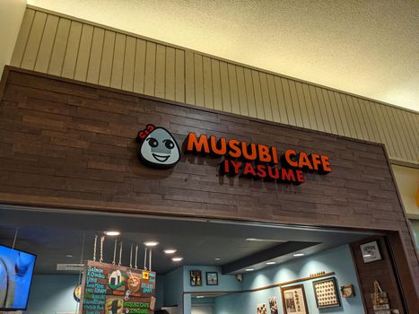 Honolulu - July 5, 2021:  Musubi Cafe Iyasume sign above store in the Kahala Mall.