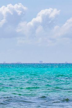 Tropical mexican beach landscape panorama with clear turquoise blue water in Playa del Carmen Mexico.