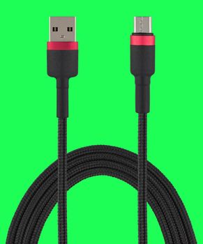 cable with USB and micro USB connector, isolated on a green background