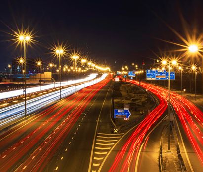 Dubai, UAE - 02.22.2021 Shot of a night road with light trails.