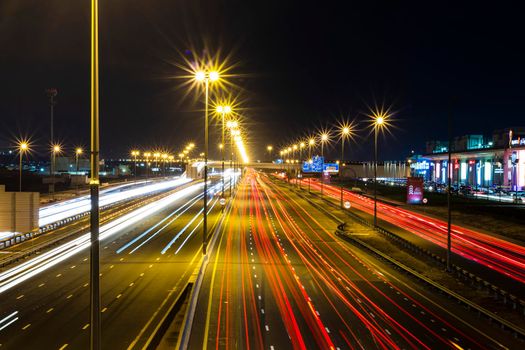 Dubai, UAE - 02.22.2021 Shot of a night road with light trails.