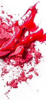 Beauty texture, cosmetic product and art of make-up concept - Crushed eyeshadows, lipstick and powder isolated on white background