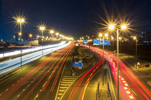 Dubai, UAE - 02.22.2021 Shot of a night road with light trails.