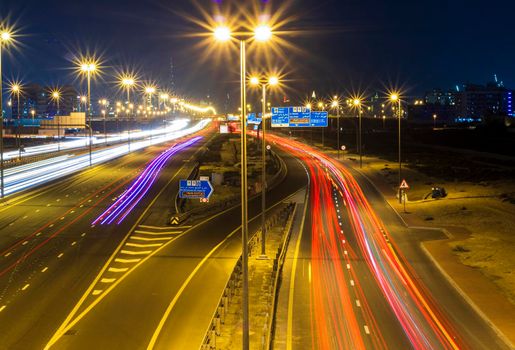 Dubai, UAE - 02.22.2021 Shot of a night road with light trails.