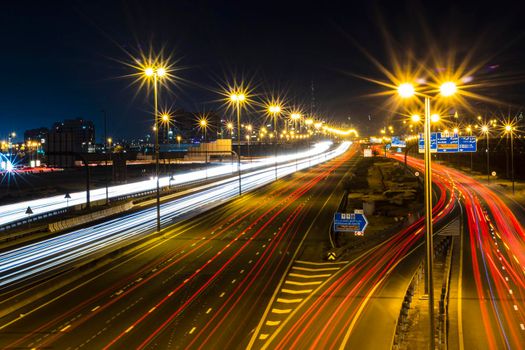 Dubai, UAE - 02.22.2021 Shot of a night road with light trails.