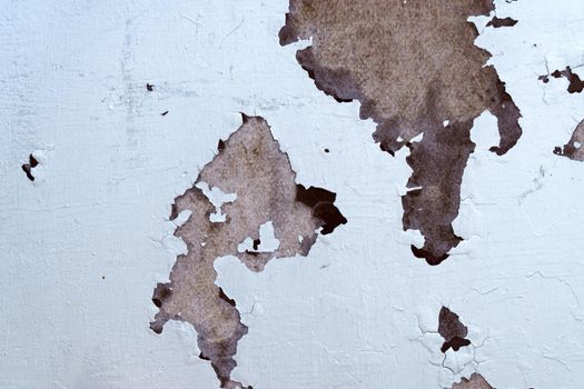 White peeling paint rust texture grunge background of a white painted.