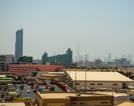 View of not a usual Dubai's skyline with warehouse on foreground. UAE. Outdoors shot