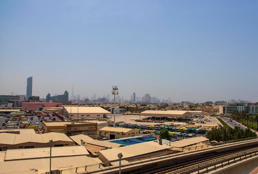 View of not a usual Dubai's skyline with warehouse on foreground. UAE. Outdoors shot