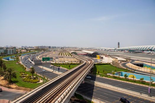 View of a Dubai international Airport, terminal 3. Terminal 3 metro station. Airport road. UAE. Outdoor