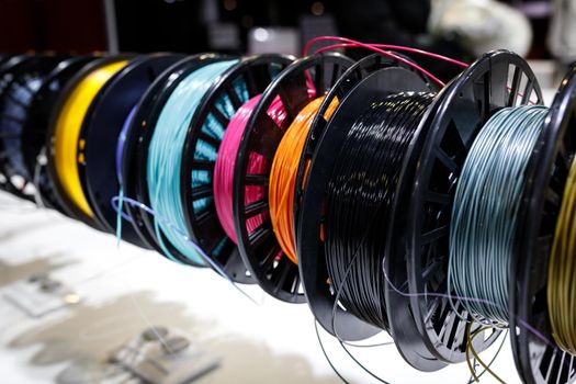 Lots of different coils with Colorful plastic PLA and ABS with filament for printing on a 3D pen.