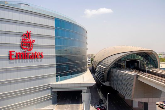 Emirates Airlines head quarters metro station in Dubai, UAE. Mid of the day shot