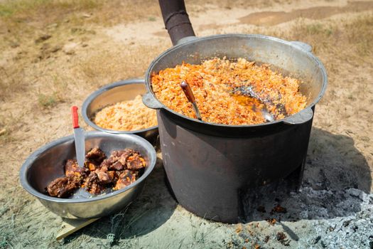 Central Asian cuisine, catering in the form of pilaf in the steppe.