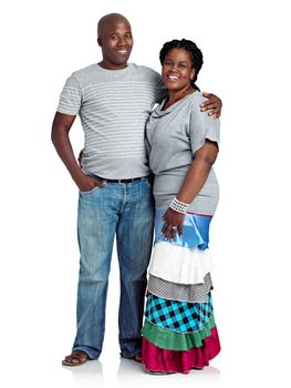 Married to my best friend. Studio shot of a happy black couple standing against a white background