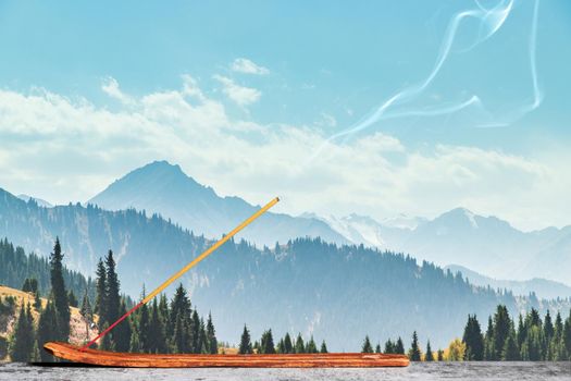 Burning incense stick in the asian mountains. Comosition with copy space