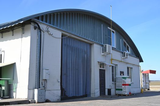 Outdoor picture of large industrial and commercial steel buildings