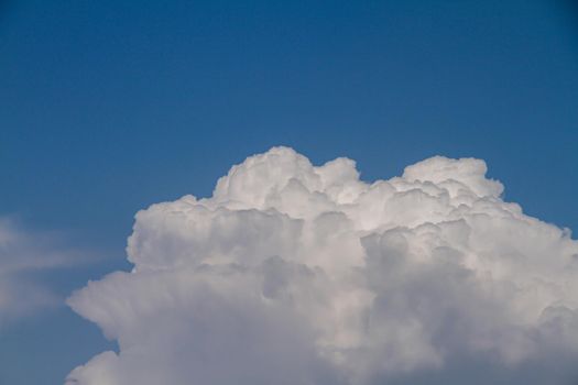 White fluffy big clouds against sky landscape