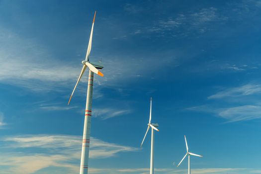 Green energy on wind turbines and wind turbines. Alternative energy sources and renewable energy sources. Power generation and generators of power plants.Wind farm and wind,environmental conservation