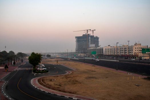 Foggy morning in Dubai city. UAE.