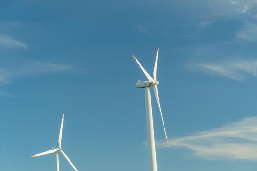 Green energy on wind turbines and wind turbines. Alternative energy sources and renewable energy sources. Power generation and generators of power plants.Wind farm and wind,environmental conservation