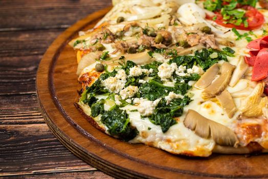 Assorted handmade Argentinian pizza on stone background