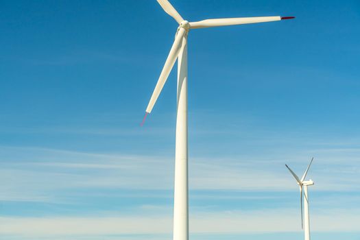 Green energy on wind turbines and wind turbines. Alternative energy sources and renewable energy sources. Power generation and generators of power plants.Wind farm and wind,environmental conservation