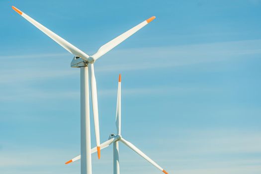 Green energy on wind turbines and wind turbines. Alternative energy sources and renewable energy sources. Power generation and generators of power plants.Wind farm and wind,environmental conservation