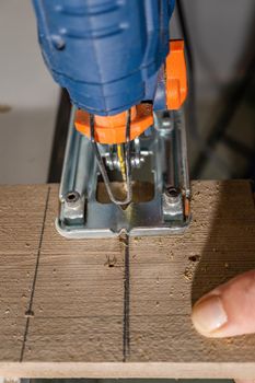 close-up of a jigsaw cutting wood