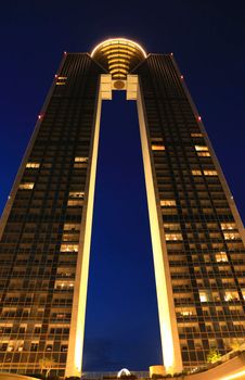 Benidorm, Alicante, Spain- September 11, 2022: Modern architecture building called Intempo on the Poniente Beach Area in Benidorm at night