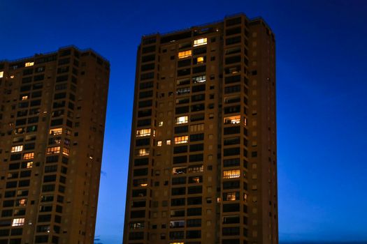 Benidorm, Alicante, Spain- September 11, 2022: Modern architecture buildings on the Poniente Beach Area in Benidorm at night