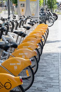 BRUSSELS,BELGIUM - June 02, 2022: public Villo bicycles parked in the sharing, High quality photo