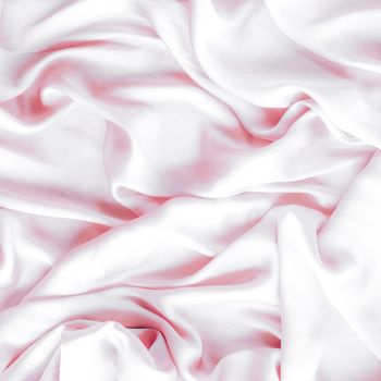 Elegant fabric texture, abstract backdrop and modern pastel colours concept - Pink soft silk waves, flatlay background