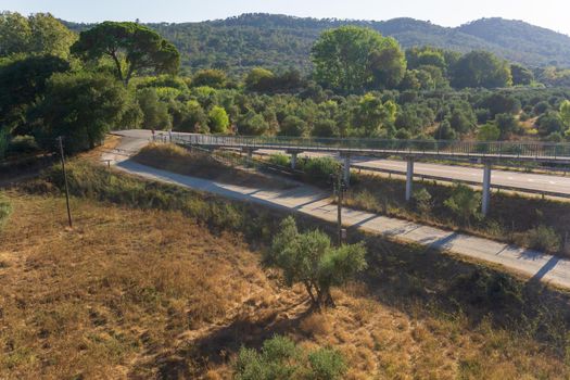 Pedestrian bridge over the road outside the city in Portugal